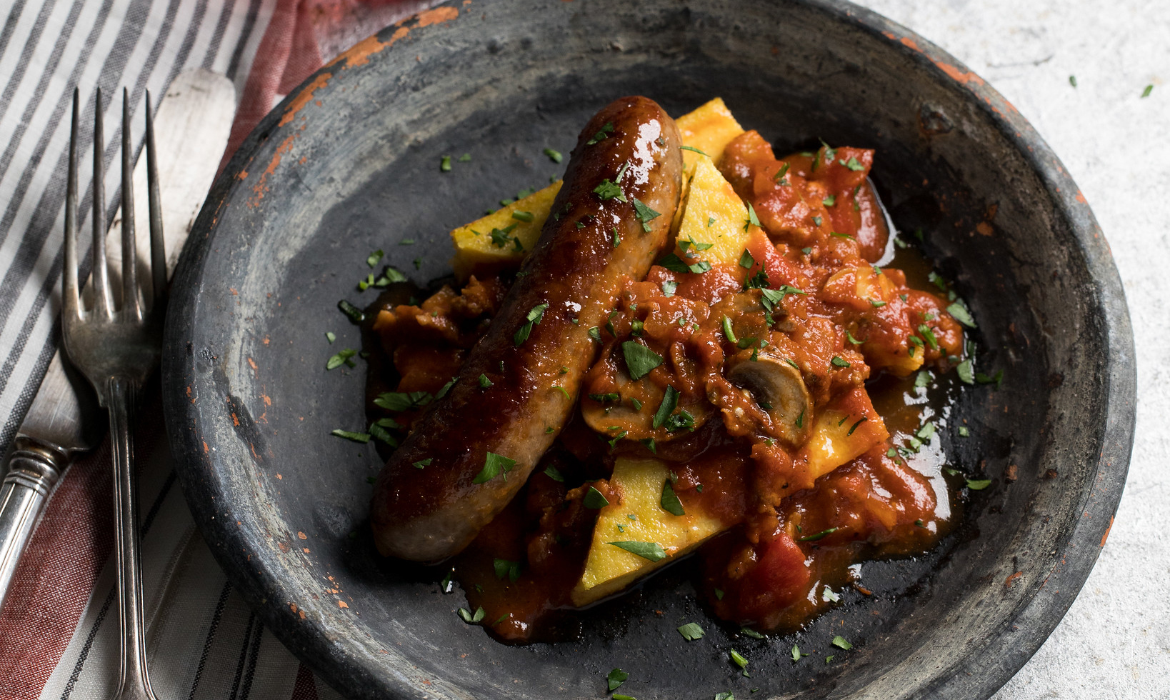 Baked Polenta with Sausage and Mushroom Sauce